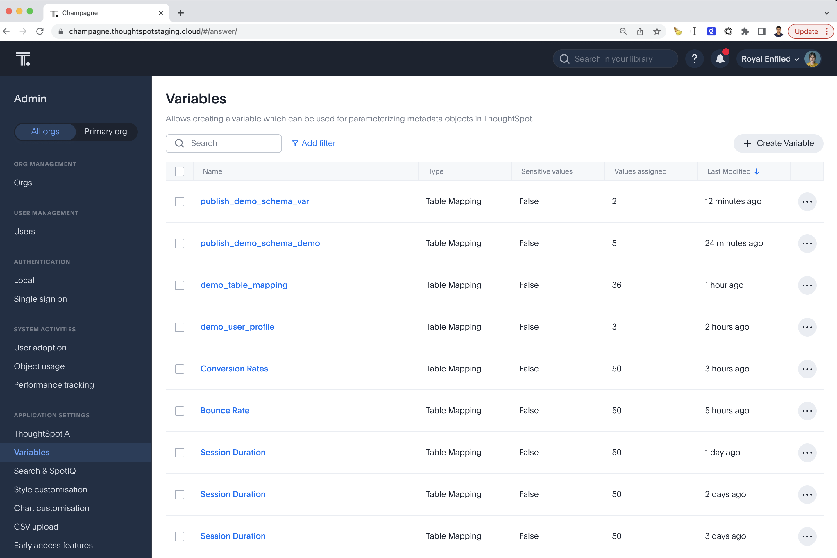 The Variables page in Admin: a searchable table of variables with type, sensitive values, values assigned and last modified columns, and a Create Variable button